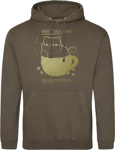Angry cat before drinking coffee