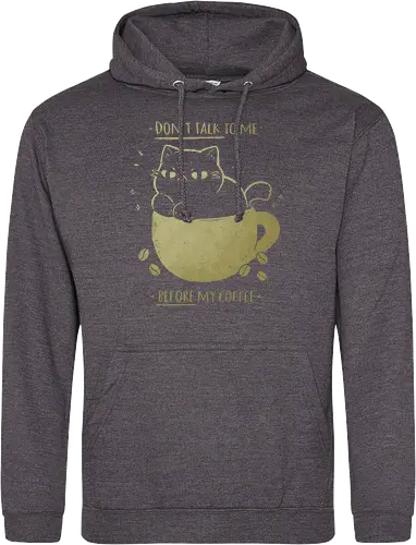 Angry cat before drinking coffee