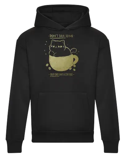 Angry cat before drinking coffee