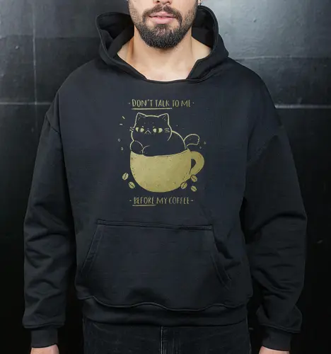 Angry cat before drinking coffee