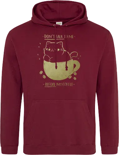 Angry cat before drinking coffee
