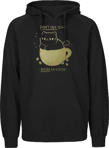 Angry cat before drinking coffee