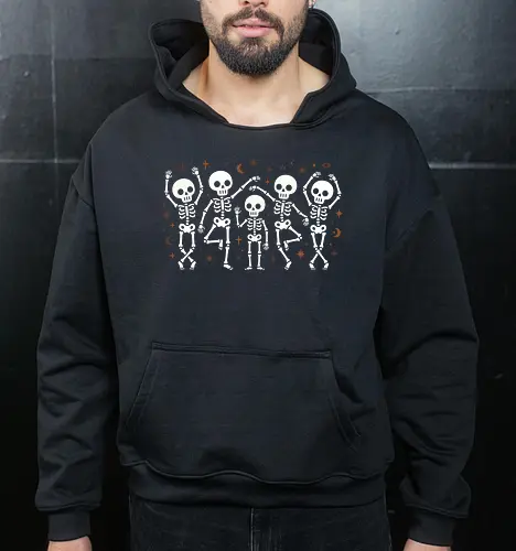 Celestial Spooks: The Dancing Skeletons - cute dancing skeletons shirt, boho witchy graphic tee, celestial halloween apparel, spooky cute streetwear, pastel goth skeleton merch, minimalist skull design, moon and stars clothing, aesthetic autumn fashion, friendly skeleton illustration, indie alternative halloween tee - Cropped Hoodie