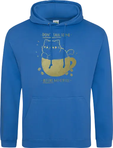 Angry cat before drinking coffee