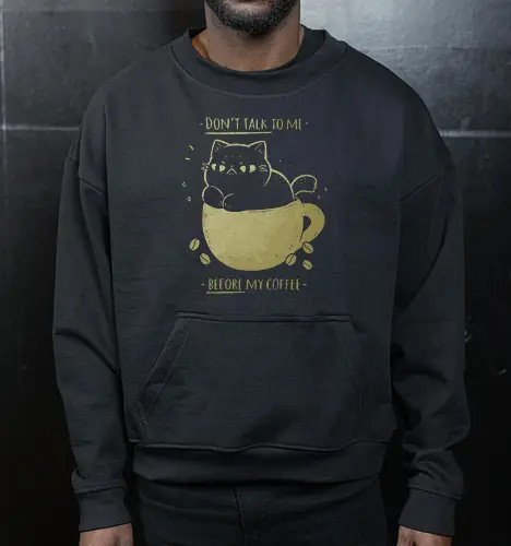 Angry cat before drinking coffee