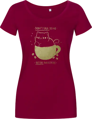 Angry cat before drinking coffee