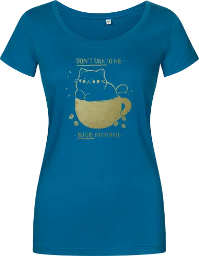 Angry cat before drinking coffee