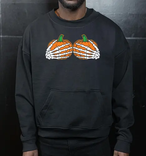 Pumpkins wrapped with skeleton hands