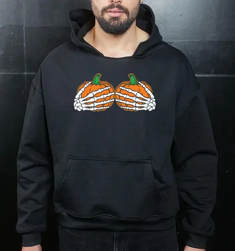 Pumpkins wrapped with skeleton hands