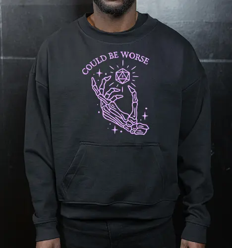 Could Be Worse: The Unlucky D20 - funny D&D shirt, TTRPG graphic tee, pastel goth skeleton apparel, d20 dice clothing, could be worse quote shirt, tabletop gamer streetwear, critical fail merch, spooky cute aesthetic fashion, sarcastic RPG design, dice goblin shirt - Cropped Sweatshirt