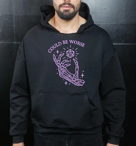 Could Be Worse: The Unlucky D20 - funny D&D shirt, TTRPG graphic tee, pastel goth skeleton apparel, d20 dice clothing, could be worse quote shirt, tabletop gamer streetwear, critical fail merch, spooky cute aesthetic fashion, sarcastic RPG design, dice goblin shirt - Cropped Hoodie